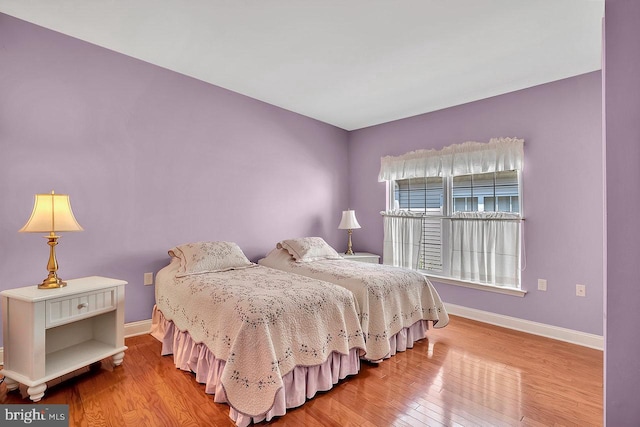 332 Blanketflower Ln, West Windsor, NJ 08550 - bedroom featuring baseboards and wood finished floors