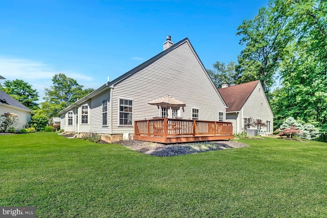 332 Blanketflower Ln, West Windsor, NJ 08550 - rear view of property featuring a chimney, a wooden deck, a yard, and cooling unit