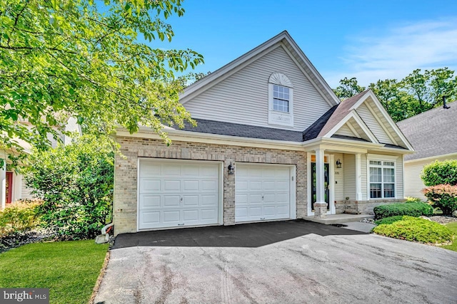 332 Blanketflower Ln, West Windsor, NJ 08550 - traditional home with brick siding, asphalt driveway, and a shingled roof