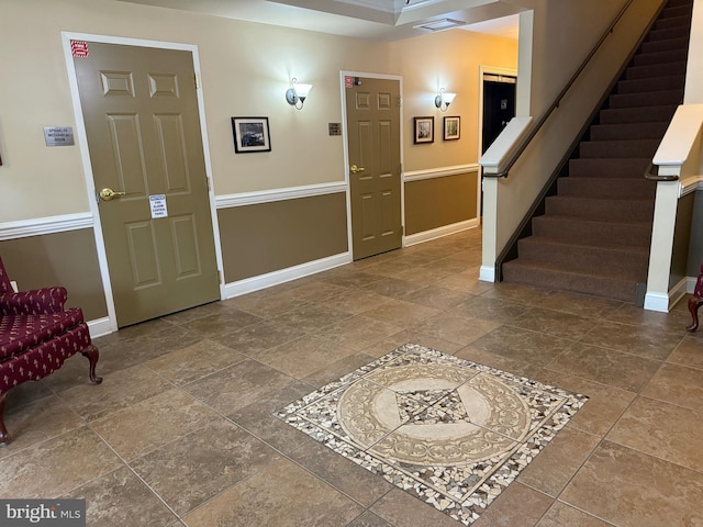 902 Macphail Woods Xing Unit 4F, Bel Air, MD 21015 - foyer entrance featuring baseboards, stairway, and stone finish floors