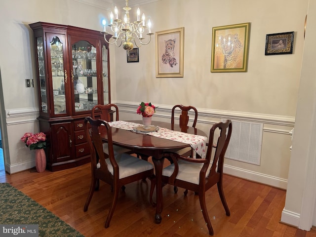 902 Macphail Woods Xing Unit 4F, Bel Air, MD 21015 - dining room featuring a chandelier, wood finished floors, and crown molding