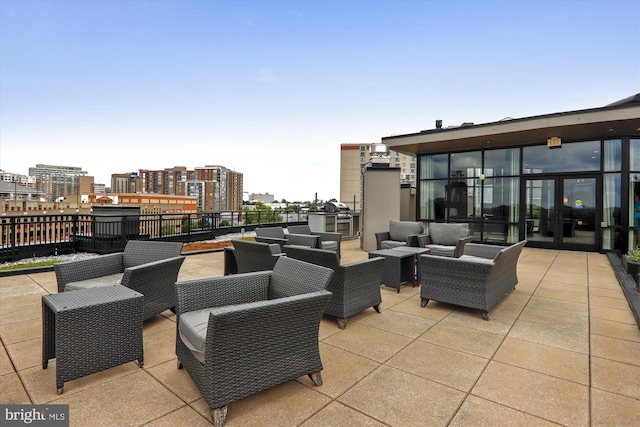 8005 13th St Unit 411, Silver Spring, MD 20910 - view of patio featuring an outdoor hangout area, a view of city, and french doors