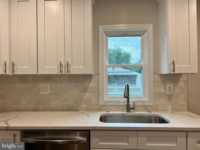 34 Hornets Nest Ln, Fredericksburg, VA 22405 - kitchen with stainless steel dishwasher, a sink, and white cabinetry