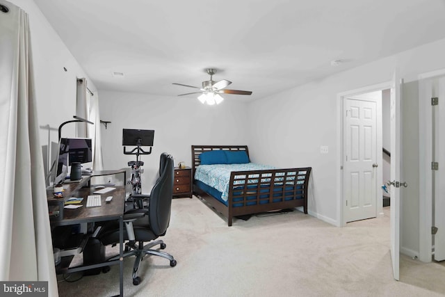 13136 Dowdens Station Way, Clarksburg, MD 20871 - bedroom with light carpet, a desk, baseboards, and a ceiling fan