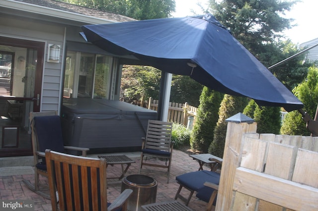 2404 Blue Valley Dr, Silver Spring, MD 20904 - view of patio with a hot tub, an outdoor fire pit, and outdoor dining space