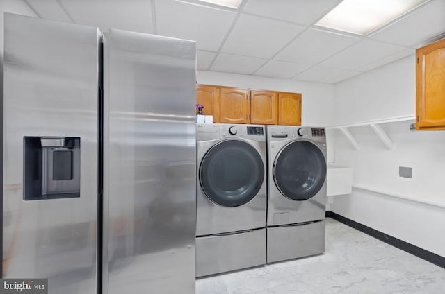 2404 Blue Valley Dr, Silver Spring, MD 20904 - laundry room featuring cabinet space and washer and dryer