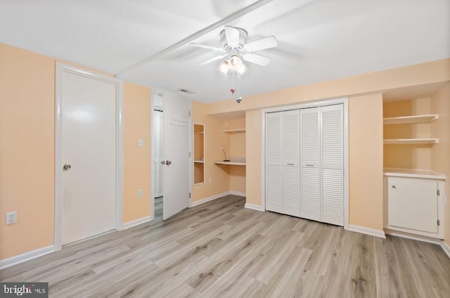 2404 Blue Valley Dr, Silver Spring, MD 20904 - unfurnished bedroom with light wood-type flooring, baseboards, ceiling fan, and a closet