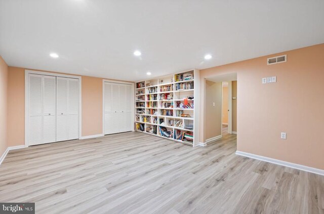 2404 Blue Valley Dr, Silver Spring, MD 20904 - unfurnished bedroom featuring multiple closets, wood finished floors, baseboards, and recessed lighting