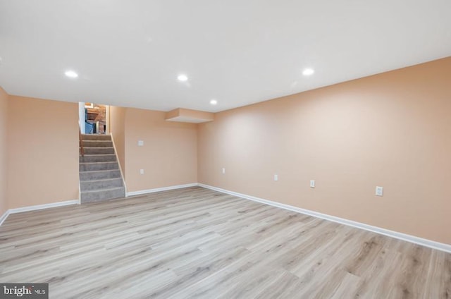 2404 Blue Valley Dr, Silver Spring, MD 20904 - finished below grade area with stairway, light wood-style floors, baseboards, and recessed lighting