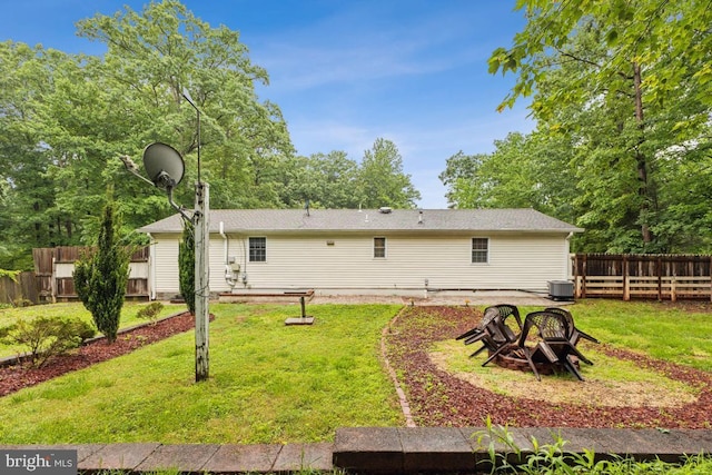 11617 Smithfield Rd, Manassas, VA 20112 - rear view of house featuring an outdoor fire pit