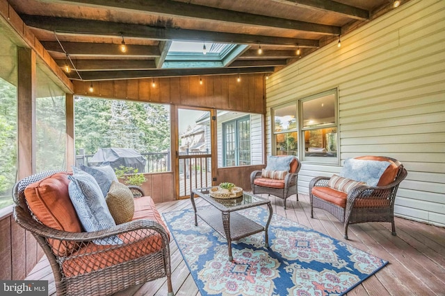 727 Hemlock Rd, Media, PA 19063 - sunroom featuring a skylight, healthy amount of natural light, beamed ceiling, and an outdoor living space