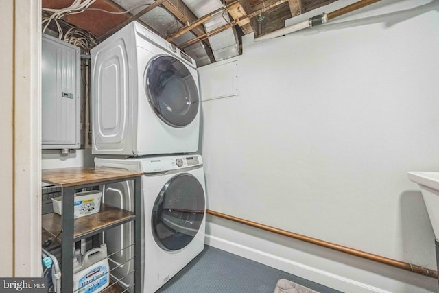 727 Hemlock Rd, Media, PA 19063 - washroom featuring stacked washer / dryer and electric panel
