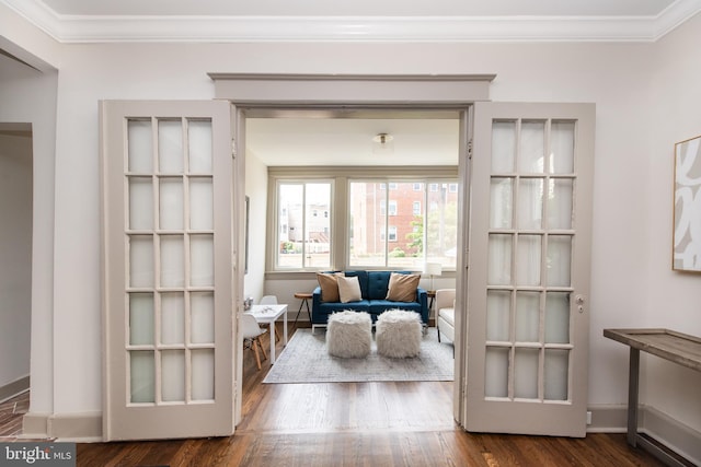 110 Varnum St NW, Washington, DC 20011 - living area featuring crown molding, wood finished floors, and baseboards