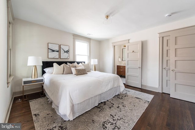 110 Varnum St NW, Washington, DC 20011 - bedroom featuring dark wood-style floors and baseboards