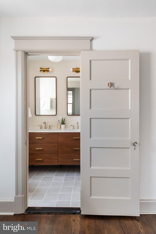 110 Varnum St NW, Washington, DC 20011 - bathroom featuring double vanity and wood finished floors
