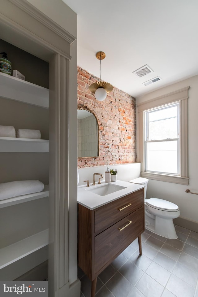 110 Varnum St NW, Washington, DC 20011 - bathroom with vanity, toilet, and tile patterned floors