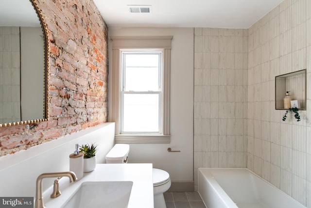 110 Varnum St NW, Washington, DC 20011 - bathroom with toilet, tile patterned flooring, plenty of natural light, and a bath