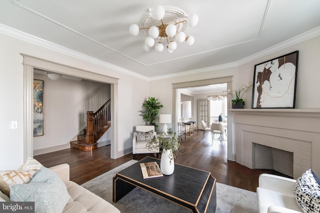 110 Varnum St NW, Washington, DC 20011 - living room featuring a chandelier, stairs, wood finished floors, crown molding, and baseboards