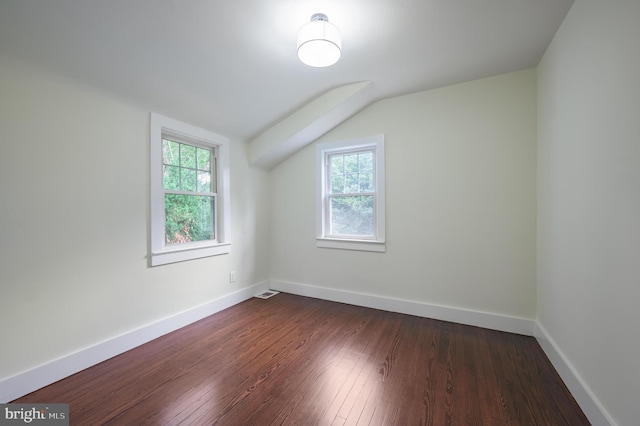 211 N Vineyard Blvd, Collingswood, NJ 08108 - bonus room featuring lofted ceiling, healthy amount of natural light, and dark wood-style floors