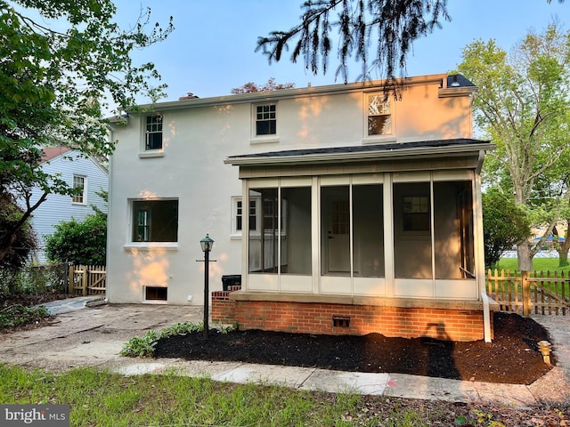 211 N Vineyard Blvd, Collingswood, NJ 08108 - rear view of house with a sunroom and stucco siding