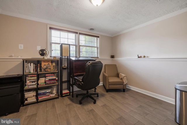 6402 Devonshire Ln, Frederick, MD 21703 - home office featuring a textured ceiling, wood finished floors, crown molding, and baseboards