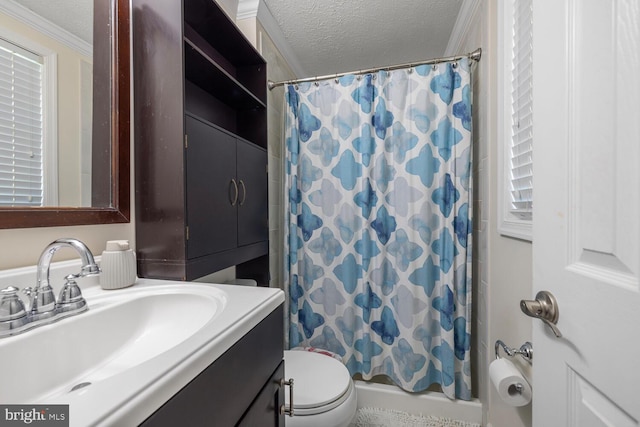 6402 Devonshire Ln, Frederick, MD 21703 - bathroom featuring vanity, toilet, a textured ceiling, ornamental molding, and shower / bath combo with shower curtain