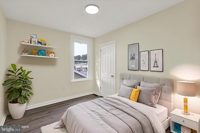443 N 2nd St, Wormleysburg, PA 17043 - bedroom featuring dark wood-style flooring and baseboards