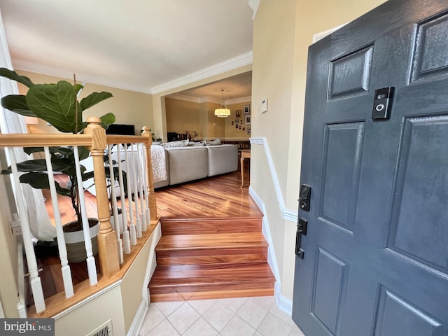 1310 Sundial Dr, Reston, VA 20194 - entryway with ornamental molding and light tile patterned floors
