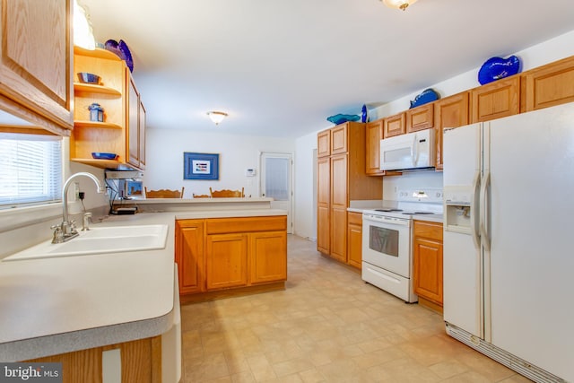2784 Moran Dr, Waldorf, MD 20601 - kitchen with white appliances, open shelves, a sink, and light countertops