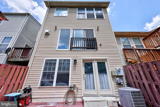 17455 Kagera Dr, Dumfries, VA 22025 - rear view of property featuring cooling unit