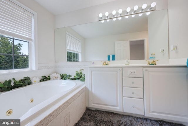 17455 Kagera Dr, Dumfries, VA 22025 - bathroom featuring a jetted tub and double vanity