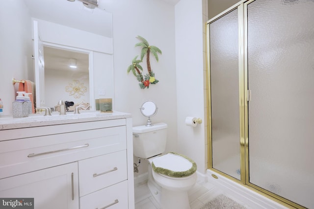 17455 Kagera Dr, Dumfries, VA 22025 - bathroom with toilet, vanity, a shower stall, and tile patterned flooring