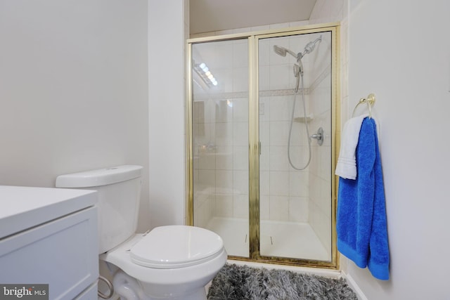 17455 Kagera Dr, Dumfries, VA 22025 - full bathroom featuring toilet, a stall shower, and vanity