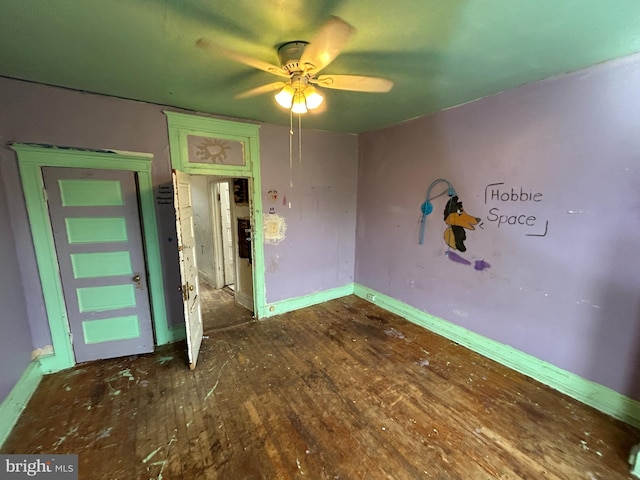 2904 Winchester St, Baltimore, MD 21216 - empty room with ceiling fan, wood finished floors, and baseboards