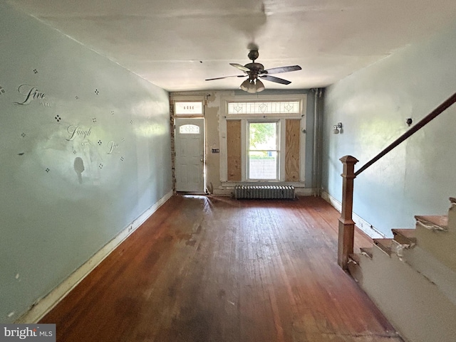 2904 Winchester St, Baltimore, MD 21216 - entryway featuring radiator, baseboards, wood finished floors, and a ceiling fan
