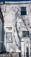 1743 E Oliver St, Baltimore, MD 21213 - rear view of house