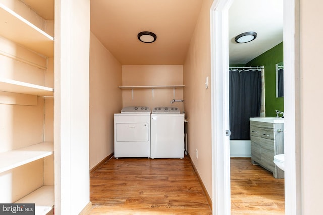 2014 N 4th St, Philadelphia, PA 19122 - washroom with washer and clothes dryer and light wood-style flooring