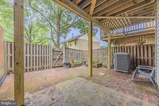 6150 Castletown Way, Alexandria, VA 22310 - fenced backyard featuring central AC unit, a patio area, and a gate