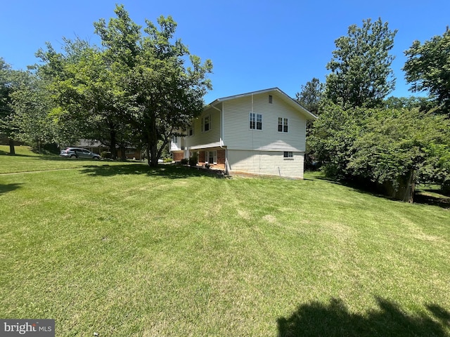 7001 Kepner Ct, Lanham, MD 20706 - view of home's exterior featuring a lawn and brick siding