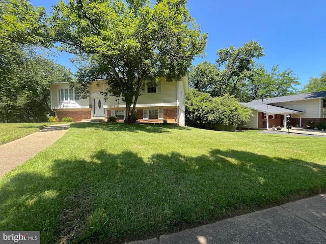 7001 Kepner Ct, Lanham, MD 20706 - view of front facade featuring brick siding and a front lawn