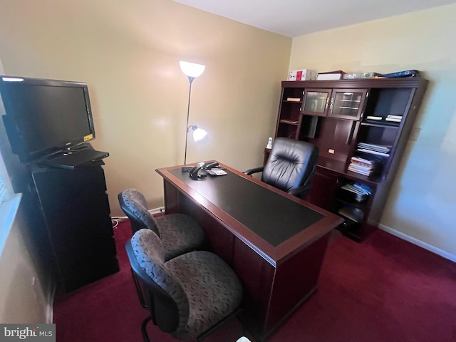 7001 Kepner Ct, Lanham, MD 20706 - office area featuring dark carpet and baseboards