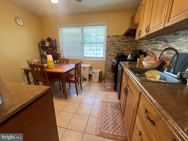 7001 Kepner Ct, Lanham, MD 20706 - kitchen featuring range hood, a sink, light tile patterned floors, stainless steel gas stove, and tasteful backsplash