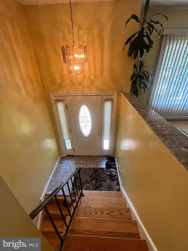7001 Kepner Ct, Lanham, MD 20706 - entrance foyer featuring a chandelier and baseboards