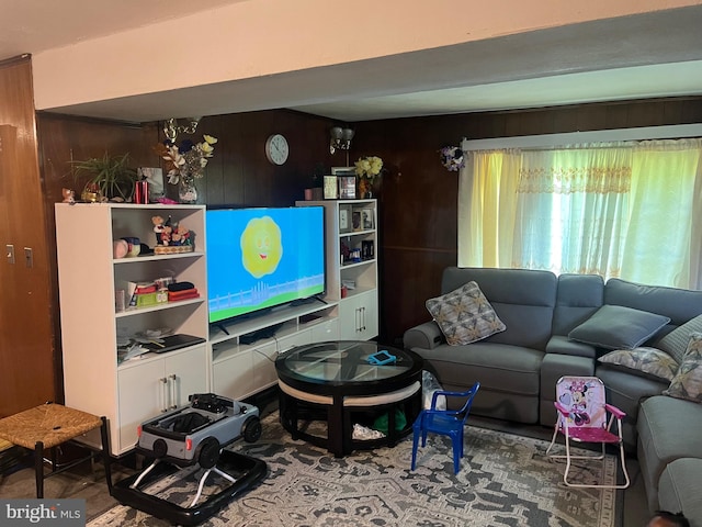 7001 Kepner Ct, Lanham, MD 20706 - living room featuring wood walls