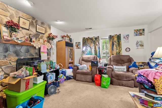 13 Tobacco Ter, Palmyra, VA 22963 - carpeted living room featuring a fireplace