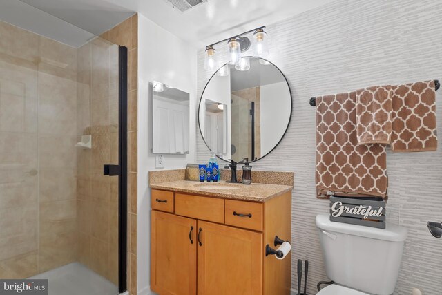 414 Water St Unit 1112, Baltimore, MD 21202 - bathroom with vanity, toilet, and a shower stall