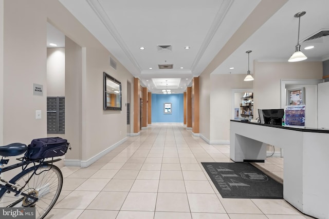 414 Water St Unit 1112, Baltimore, MD 21202 - hall with a tray ceiling, recessed lighting, light tile patterned floors, ornamental molding, and baseboards