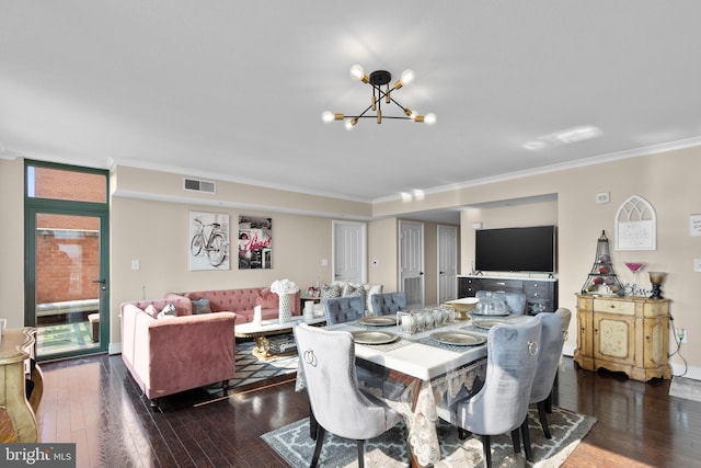 414 Water St Unit 1112, Baltimore, MD 21202 - dining area featuring a chandelier, hardwood / wood-style flooring, and crown molding
