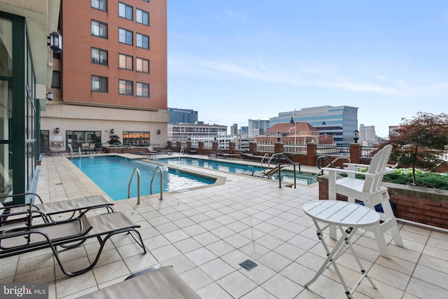 414 Water St Unit 1112, Baltimore, MD 21202 - community pool with a patio area and a view of city