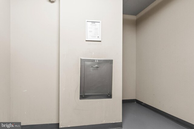 414 Water St Unit 1112, Baltimore, MD 21202 - detailed view of concrete flooring and baseboards